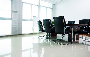 Empty conference room with table and chairs