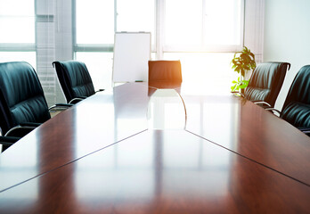 Empty conference room with table and chairs