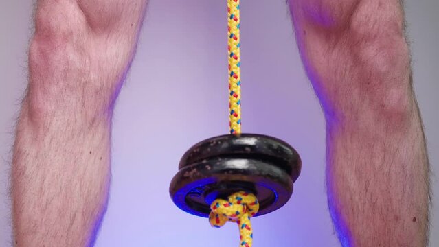 Weights between legs on rope extend manhood training 4K