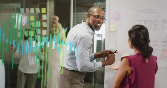 Animation of data processing over diverse business people shaking hands