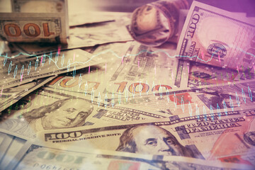 Multi exposure of forex chart drawing over us dollars bill background. Concept of financial success markets.