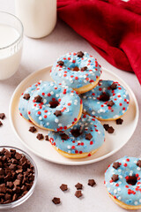 Fresh doughnuts in blue, red and white colors for 4th of July, Independence day in USA