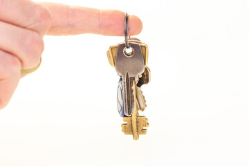 Man hold a Bunch of keys isolated on the white background