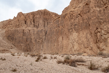 Fototapeta premium Mountains of stone desert near the Tamarim stream on the Israeli side of the Dead Sea near Jerusalem in Israel
