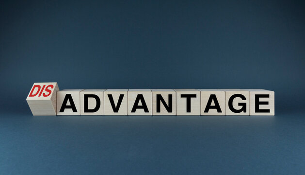 Cubes form the words Advantages or Disadvantages. Business concept