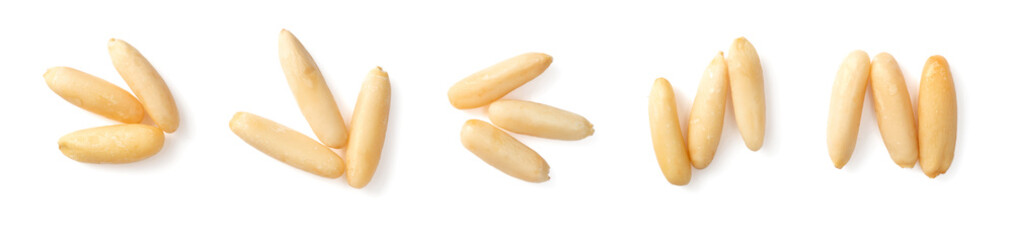 Shelled European pine nuts isolated on white background, top view.