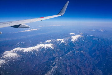 Fototapeta na wymiar 南アルプスこと赤石山脈を飛行機から一望