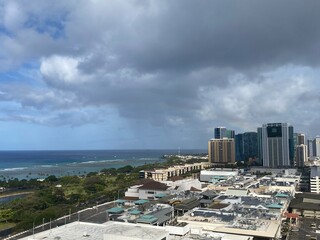 Long rainbow with dramatic clouds over the waikiki beach oahu Island, Hawaii year 2022