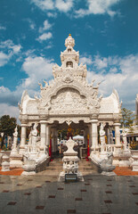 Fototapeta na wymiar Wat Ming Muang white temple in Nan province, Thailand