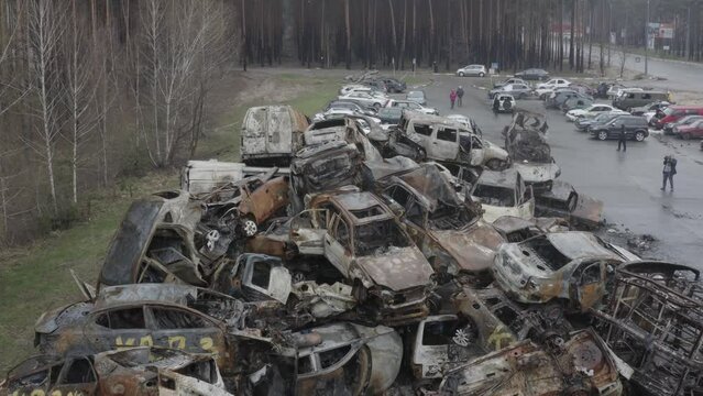 Destroyed and burned cars in Ukraine, after the invasion of Russia. Burnt cars in Irpen and Bucha