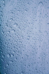 raindrops on the window in rainy days, abstract background
