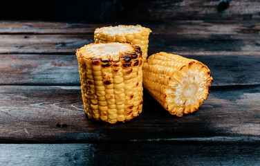 grilled head corn on a dark background