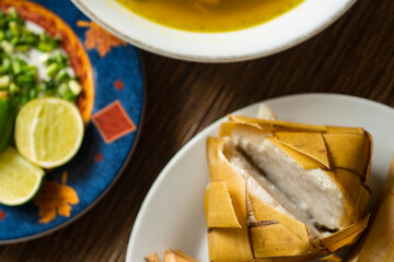 Rice cake (Ketupat) is Cooked Rice packed inside a diamond-shaped container of woven palm leaf pouch for Moslem Celebration. Eid Mubarak concept. Indonesian traditional food.