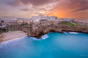 Fototapeta premium Sunset in Polignano a Mare, Puglia region in Southern Italy (Apulia)