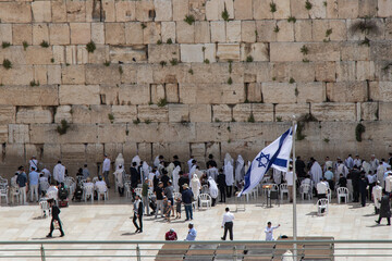 Western wall or Wailing wall in Jerusalem Israel: 22 April, 2022. Jewish pray at the Western Wall.