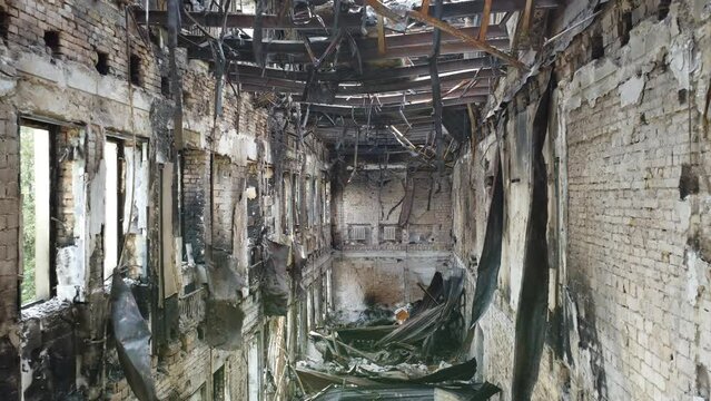 War in Ukraine. Ruins of a house in Irpin city. House after shelling. Apocalyptic background.