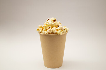 Popcorn in a cup on a white background