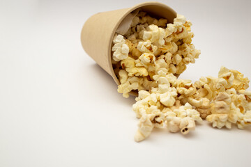 Popcorn in a cup on a white background