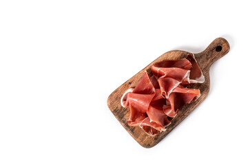 Spanish serrano ham on cutting board isolated on white background. Copy space