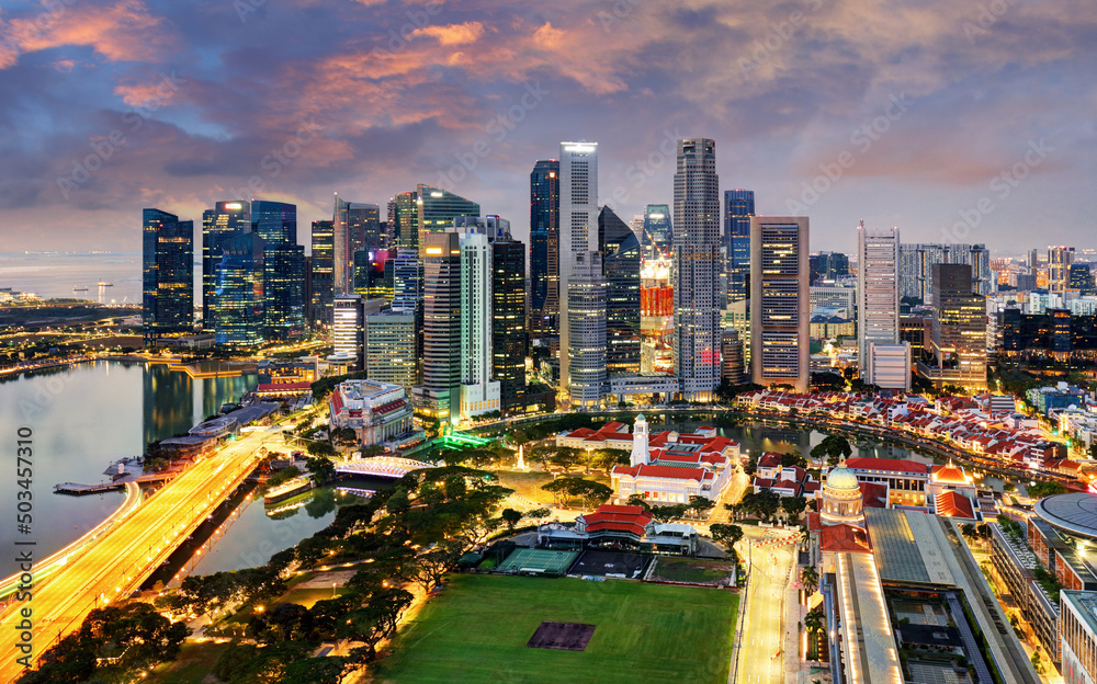 Wall mural Singapore skyline city at sunset