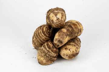 Taro Root, Pani Kachu, group isolated in extendable white  background, studio lighting, macro, tropical food, healthy food, 