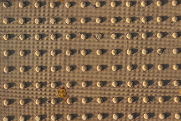 Metal Surface with Bolts Pattern