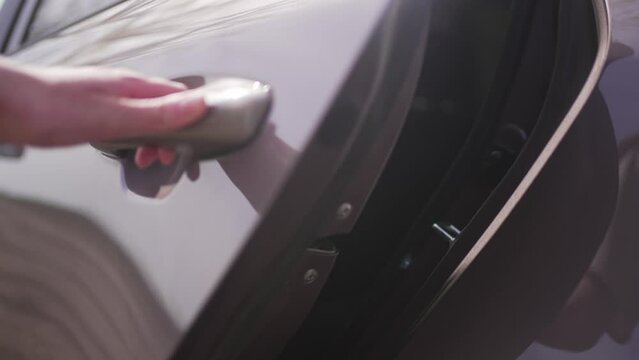 Car door opens. Passenger seat in automobile. Taxi concept 4K 10 BIT