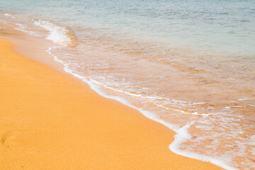 Fototapeta na wymiar Waves lap up on Ramla Beach