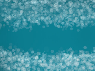 Abstract glitter bokeh background on blue-green.