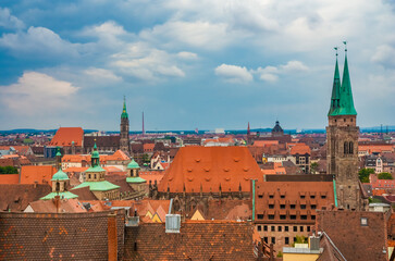 Obraz premium Gorgeous rooftop view over the historic city centre of Nürnberg, Germany. On the left stands the medieval church St. Lawrence (Lorenzkirche) and on the right the St. Sebaldus Church (Sebalduskirche).
