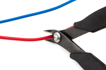 Side cutter diagonal wire cutting pliers with red and blue wires isolated on white background. clipping path