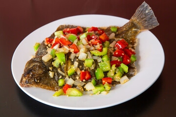 Pan-fried flounder with vegetables of traditional Cantonese yum-cha Asian gourmet cuisine meal food...