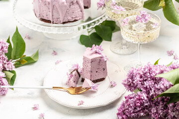 a piece of mousse cake, Delicious dessert blueberry tart with fresh berries with a bouquet of...