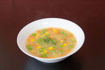 Chicken and cream corn chowder soup of traditional Cantonese yum-cha Asian gourmet cuisine meal...