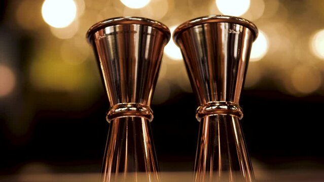 a beautiful bartender's tool - jigger. accessory for making cocktails. close-up