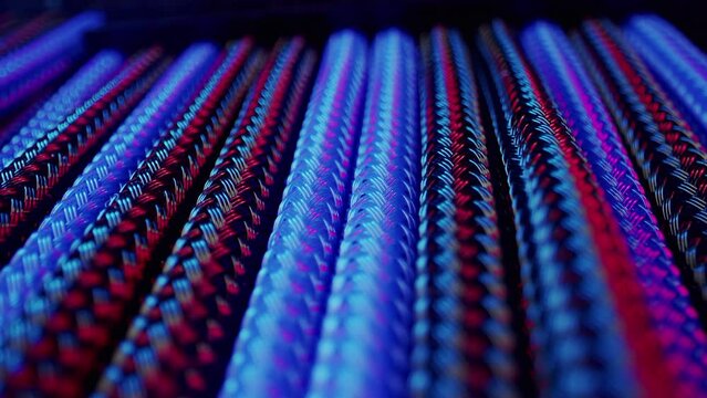 Computer modding power cable management system close up shots braided wires black and blue colors. High quality 4k footage
