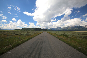 Beautiful road in the field in Grand Teton National Park, Wyoming, USA
