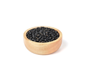 Fototapeta na wymiar Black beans in wooden bowl isolated on white background.