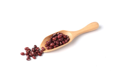 Adzuki beans or red mung beans in wooden scoop isolated on white background