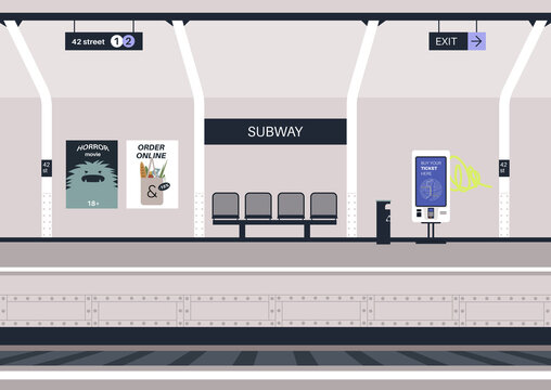 An empty subway platform with a bench and commercial posters on the wall