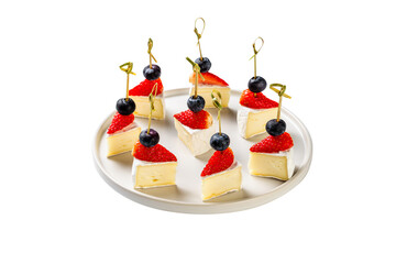 Delicious canapes with camembert sheese and strawberry