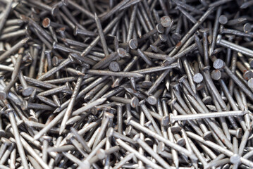 Background of metal nails top view close-up