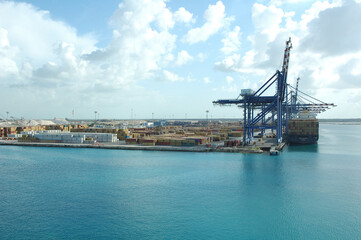 Fototapeta na wymiar cranes, ship and cargo in port