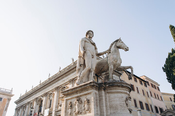 Obraz premium antique statue of a man with a horse. Roman stone statue of a man with a horse.