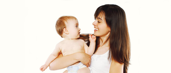 Portrait of happy smiling mother and baby playing together on white background