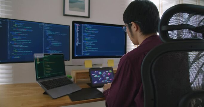 Digital transformation future workforce web DEV career development. Asia people young talent man busy work at home office reskill upskill martech job remote test on AI cloud computing cyber security.