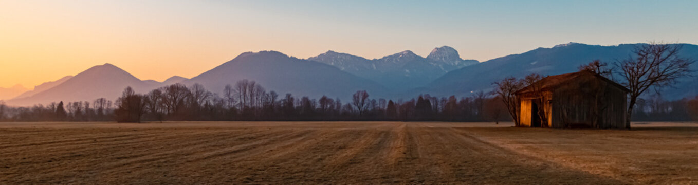 Beautiful sunrise with the Wendelstein summit in the background near Westerndorf, Rosenheim, Bavaria, Germany