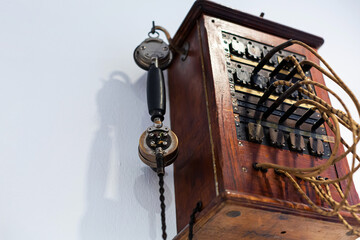Details of the antique telephone set made of wood