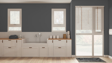 Space devoted to pet, modern laundry room in gray tones with cabinets and dog bath shower with mosaic tiles and faucet. Parquet floor and windows. Cozy mudroom interior design