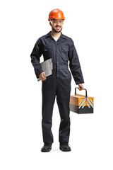 Factory worker in a uniform holding a tool box and a clipboard